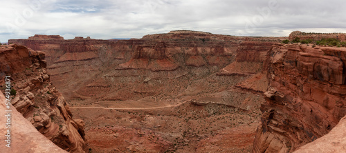Scenic American Landscape and Red Rock Mountains in Desert Canyon. Spring Season. Canyonlands National Park. Utah, United States. Nature Background Panorama