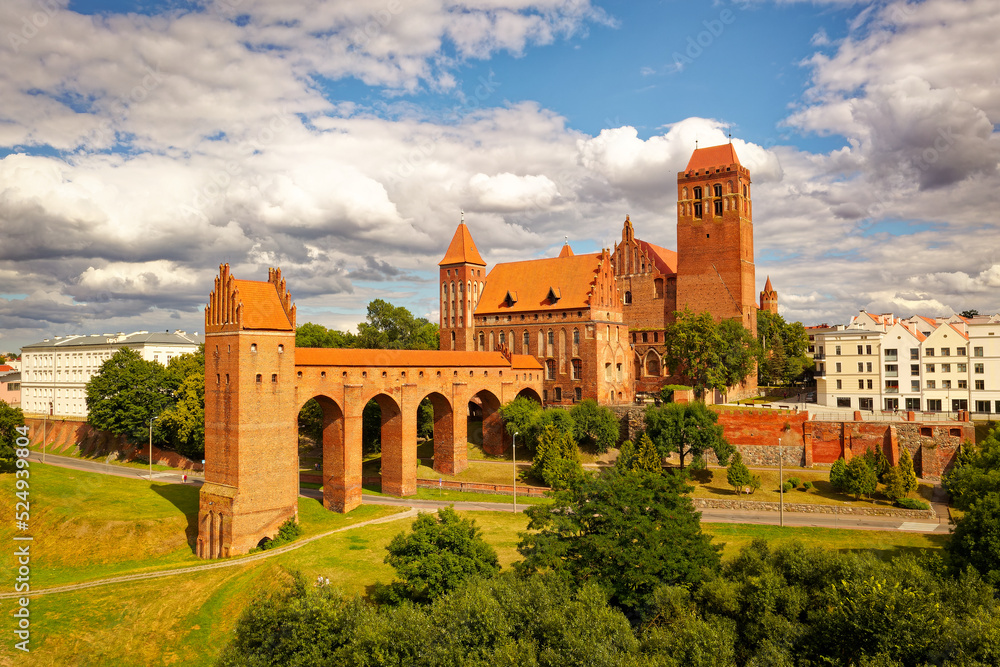 Kwidzyn Castle - Burg Marienwerder large brick gothic castle in the town of Kwidzyn, Poland, an example of the Teutonic Knights castle architecture, red bricks castle, landscape