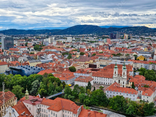 Beautiful view over the old city center of Graz, with Mariahilfer church and historic buildings, in Styria region, Austria