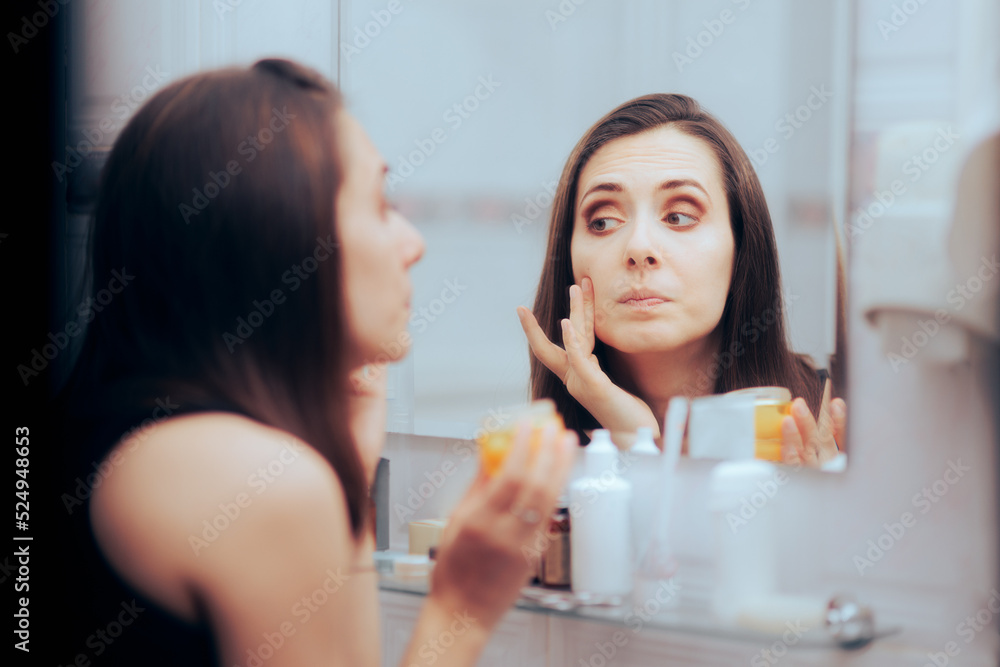 Woman Using a New Skin Care Routing Feeling Skeptical about Results. Millennial girl taking care of her dry complexion with moisturizing lotion
Woman Using a New Skin Care Routing Feeling Skeptical about Results. Millennial girl taking care of her dry complexion with moisturizing lotion