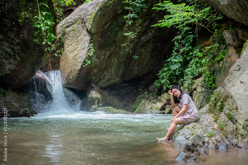 A vacation to a waterfall in the middle of the forest in the high valley. A vacation to a waterfall in the middle of the forest in the high valley.