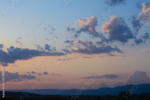 Picturesque view of beautiful countryside at sunset