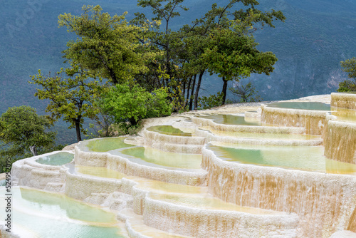 The  beautiful travertine landscape in Baishui Platform scenic spot in Diqing Tibetan Autonomous Prefecture Yunnan province, China. photo