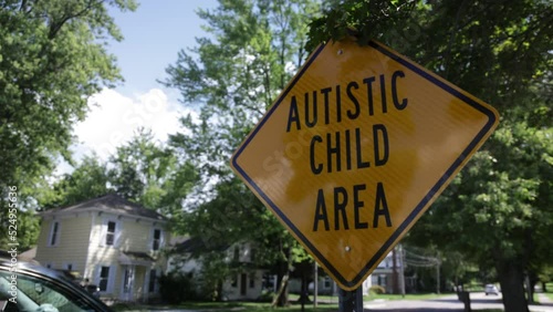 Autistic Child Area roadsign with video panning left to right. photo