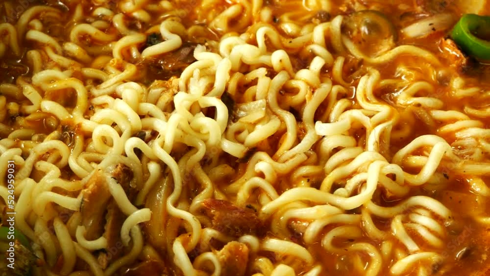 Cooking instant noodles in pan, in door Chiangmai Thailand. Cooking instant noodles in pan, in door Chiangmai Thailand.