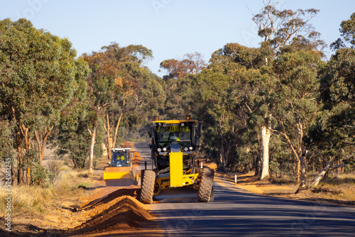 Road grader working on rural road photo