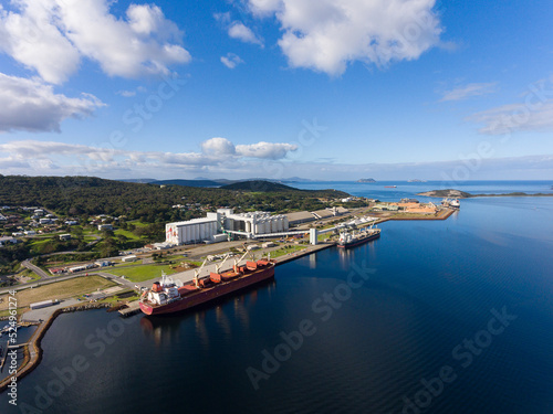 the port at albany with ships and grain silos