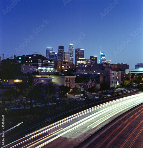 120mm medium format film photograph Los Angeles California skyline and traffic at dusk photo