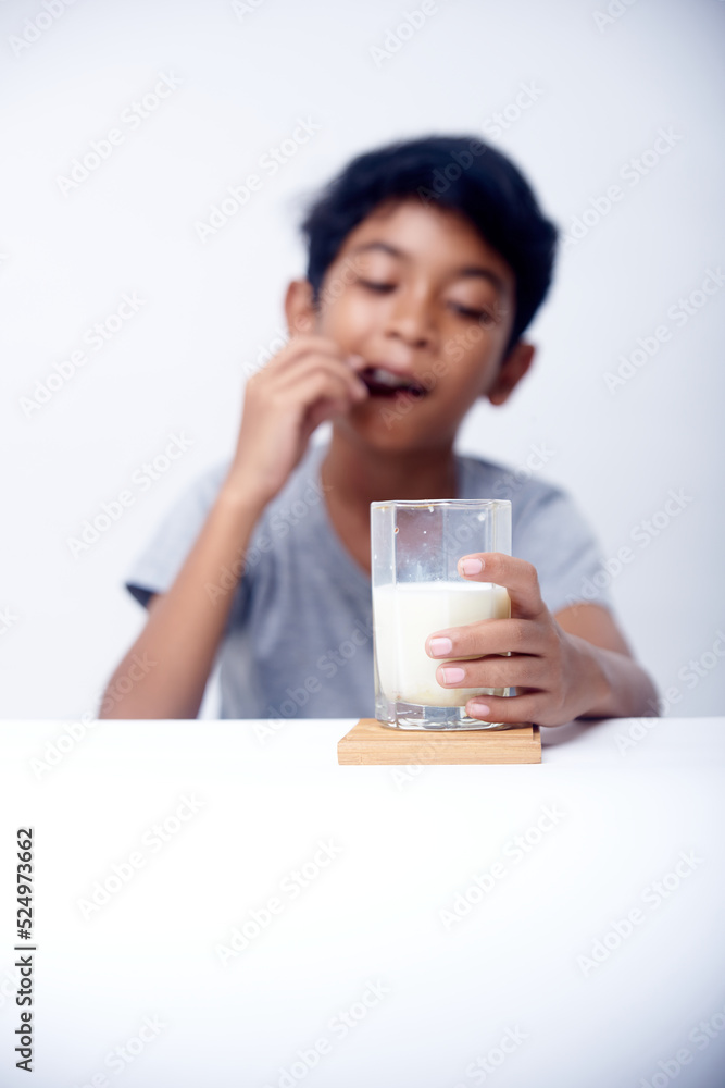 Little Boy drinking milk with fresh homemade Cocolate cookies Little Boy drinking milk with fresh homemade Cocolate cookies