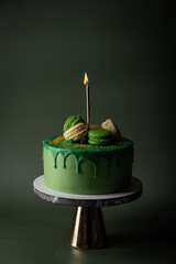 birthday cake with candles and macaroons food anniversary concept cover banner background.
