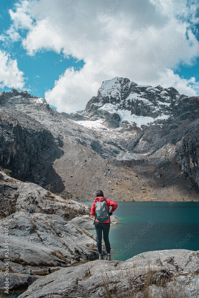 Amazing Mountainous Landscape In Peru.

photography of huaraz peru, with people with hiking clothes, lakes, mountains, colors, rainbow mountain.