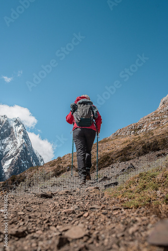 Amazing Mountainous Landscape In Peru.photography of huaraz peru, with people with hiking clothes, lakes, mountains, colors, rainbow mountain.