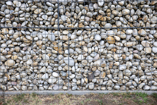 Detail of gabion wall filled with stones