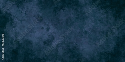 Dark blue moody speckled background, grungy marbled texture. Wide panorama backdrop. Asset for greeting, invitation card, banner, montage, collage, scrapbooking.