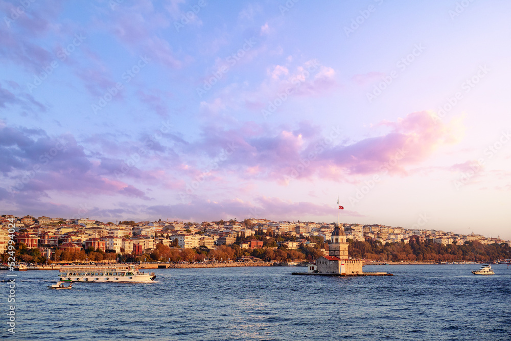 Istanbul, Turkey. Twilight scenic sunset on Bosphorus with famous Maiden's Tower (Kiz Kulesi). Scenic turkish travel background.