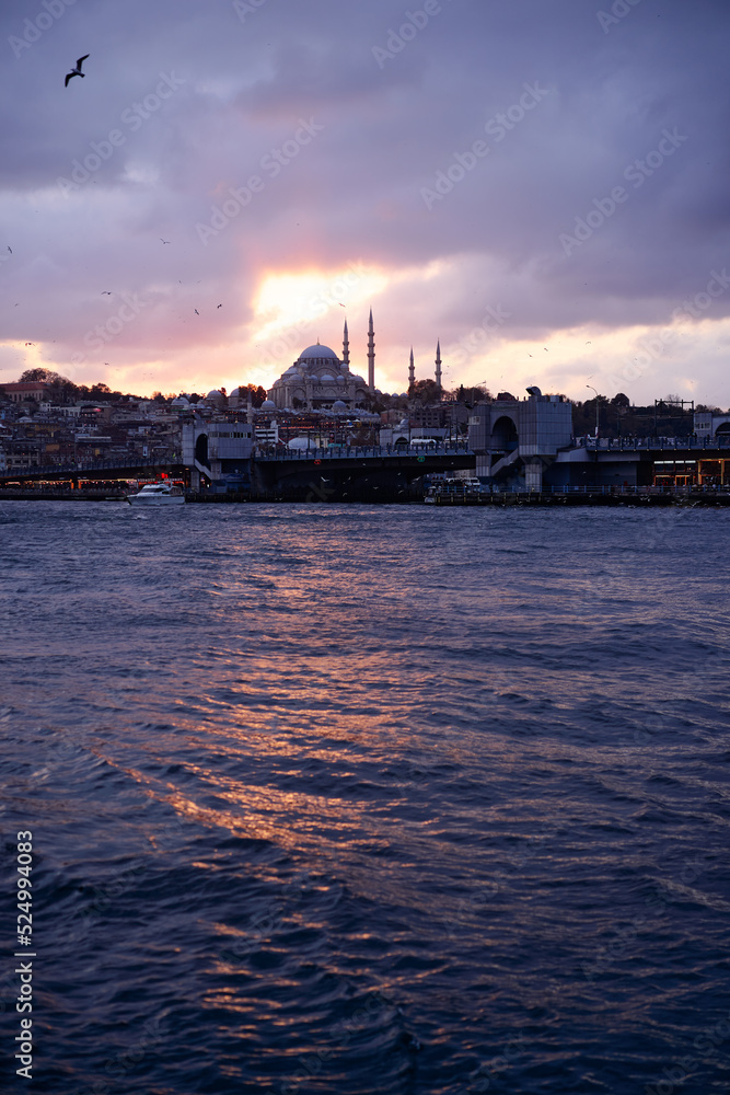 Beautiful sunset with clouds in Istanbul landscape Ortakoy Mosque, Bosphorus Bridge, Fatih Sultan Mehmet Bridge Istanbul Turkey