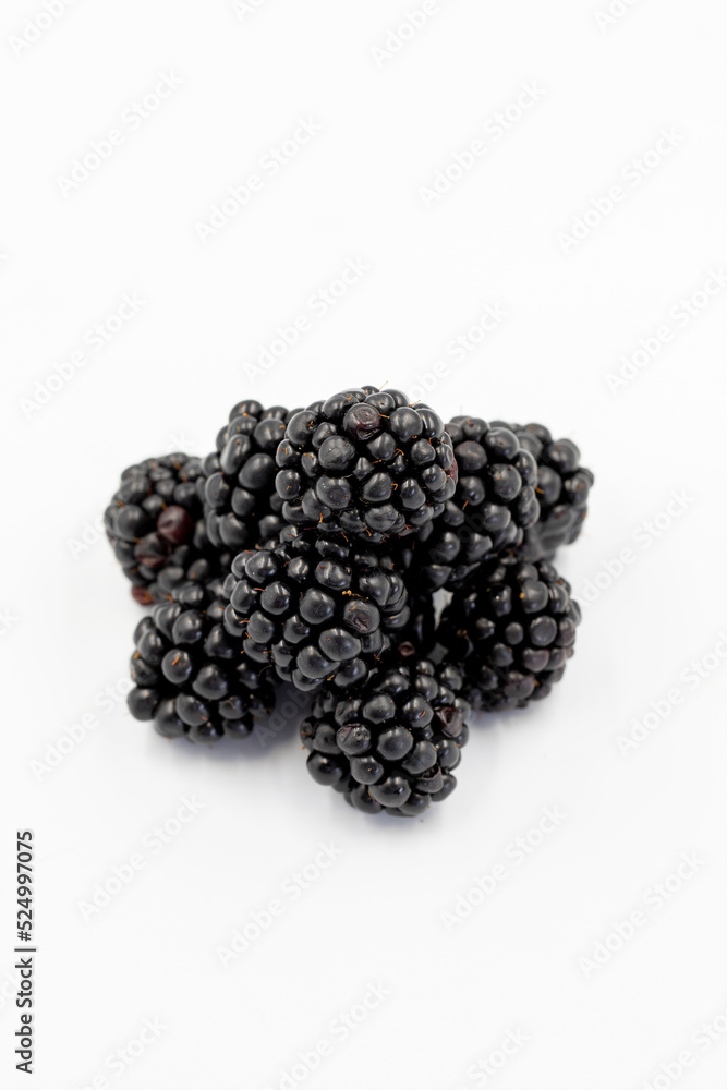 Black mulberry isolated on white background. Fresh and juicy black mulberry. Organic food. close up Black mulberry isolated on white background. Fresh and juicy black mulberry. Organic food. close up
