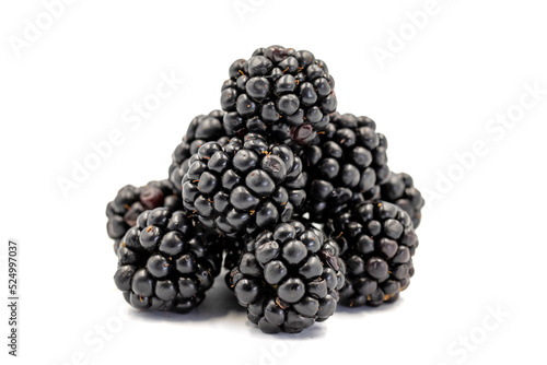 Black mulberry isolated on white background. Fresh and juicy black mulberry. Organic food. close up