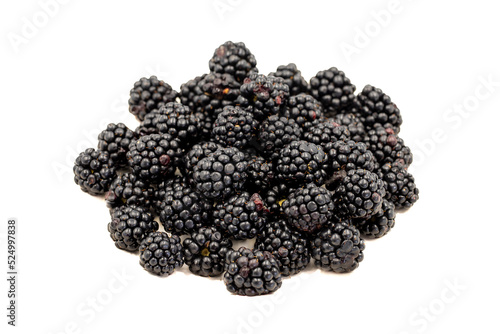 Black mulberry isolated on white background. Fresh and juicy black mulberry. Organic food. close up