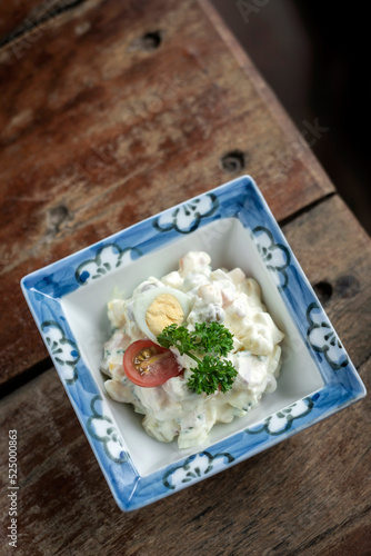 potato and egg salad tapas in rustic restaurant