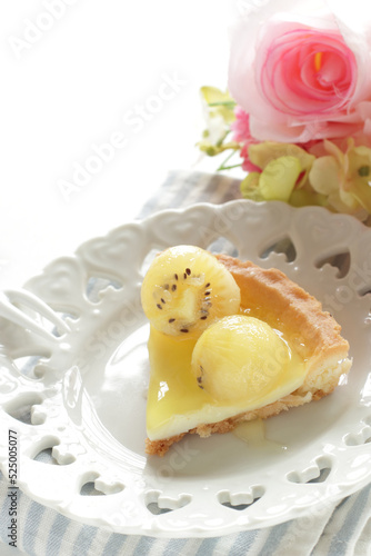 Piece of Kiwi fruit  and tart for dessert image 
