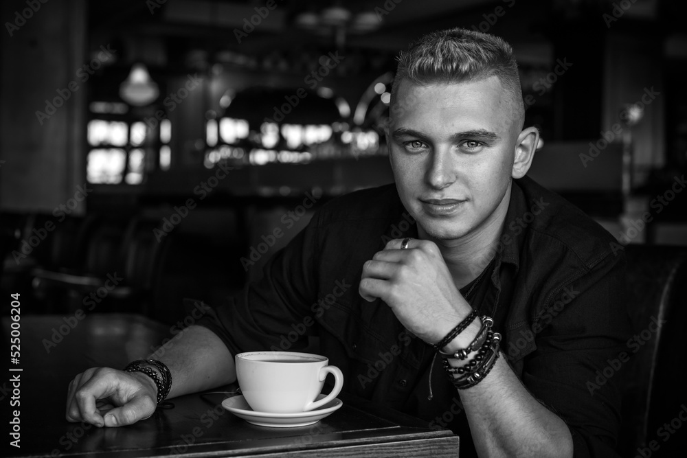 Young stylish Nordic blonde guy, portrait of modern youth. Confident boy with stylish clothes and accessories Young stylish Nordic blonde guy, portrait of modern youth. Confident boy with stylish clothes and accessories