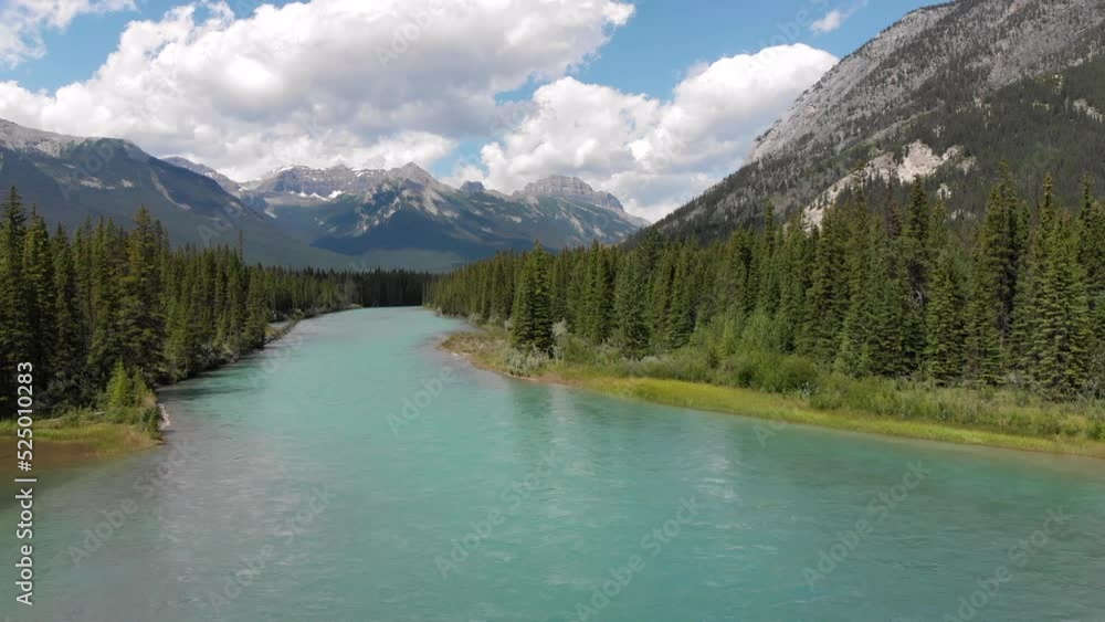 Banff National Park aerial view, flying over the Bow River in the Canadian Rockies during summer in Alberta, Canada. Banff National Park aerial view, flying over the Bow River in the Canadian Rockies during summer in Alberta, Canada.