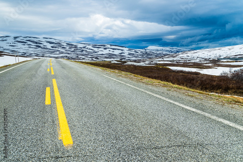 Norway, Nordland, Empty asphalt road in Saltfjellet range photo