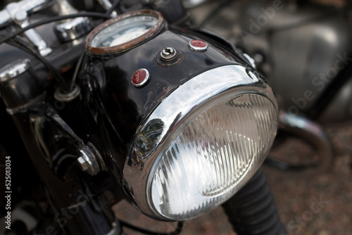 Black motorcycle headlight