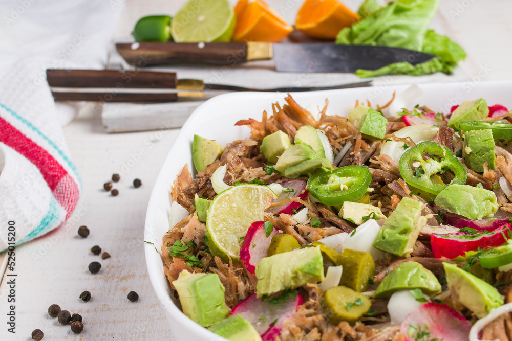 Cuban bowl with meat and slices of radish and jalapeno Cuban bowl with meat and slices of radish and jalapeno