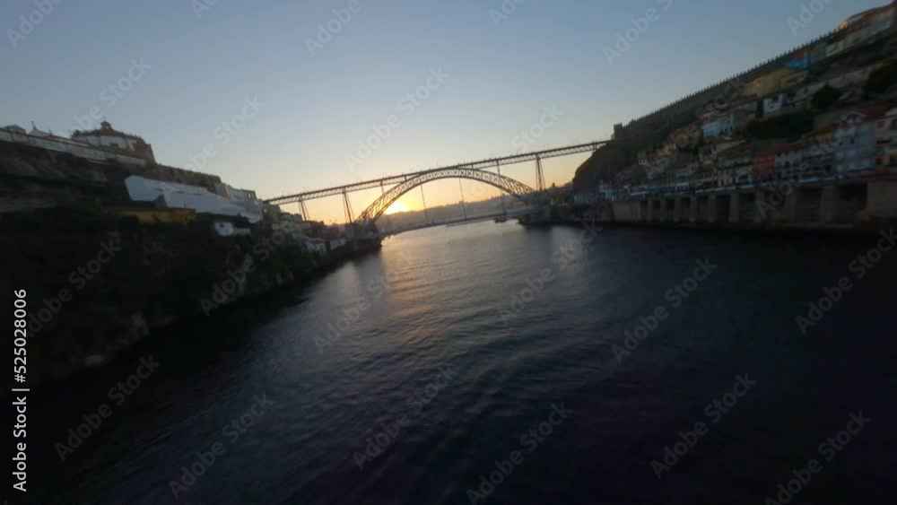 Lowlevel FPV shot near water surface of Douro river by Ribeira