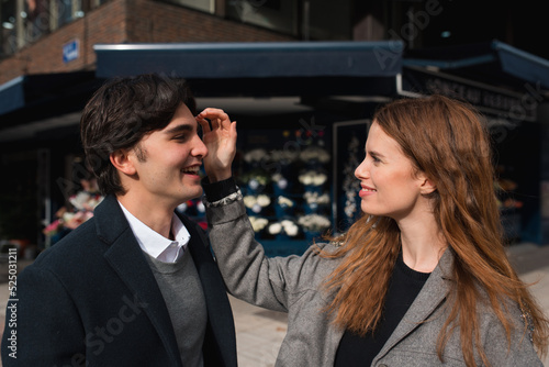 Loving couple enjoying time together on street