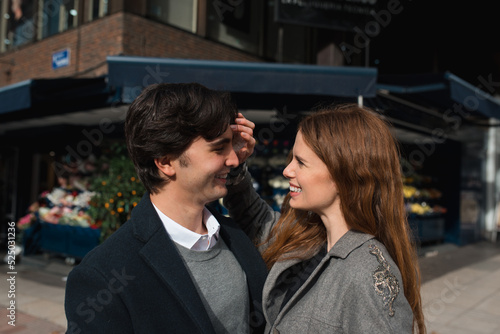 Loving couple enjoying time together on street