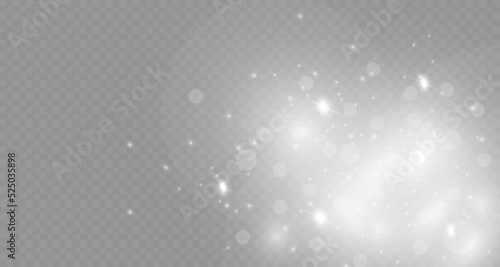Dust sparks and stars shine with a special light. Christmas light effect. Glittering particles of magic dust.Vector sparkles on a transparent background.