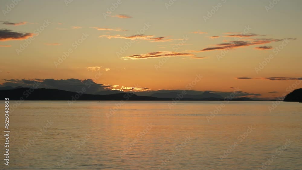 Mountains sunset from moving boat in slow motion Mountains sunset from moving boat in slow motion