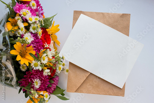 card mockup with bouquet with vivid autunm flowers. flowers background photo