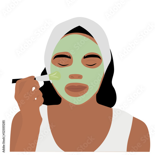 Beautiful woman applying facial mask against white background