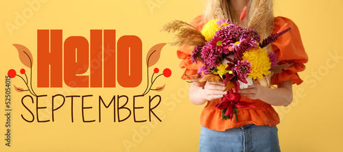 Print op canvas Woman with beautiful autumn bouquet and text HELLO SEPTEMBER on yellow backgroun
