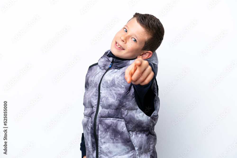 Little boy isolated on white background pointing front with happy expression Little boy isolated on white background pointing front with happy expression