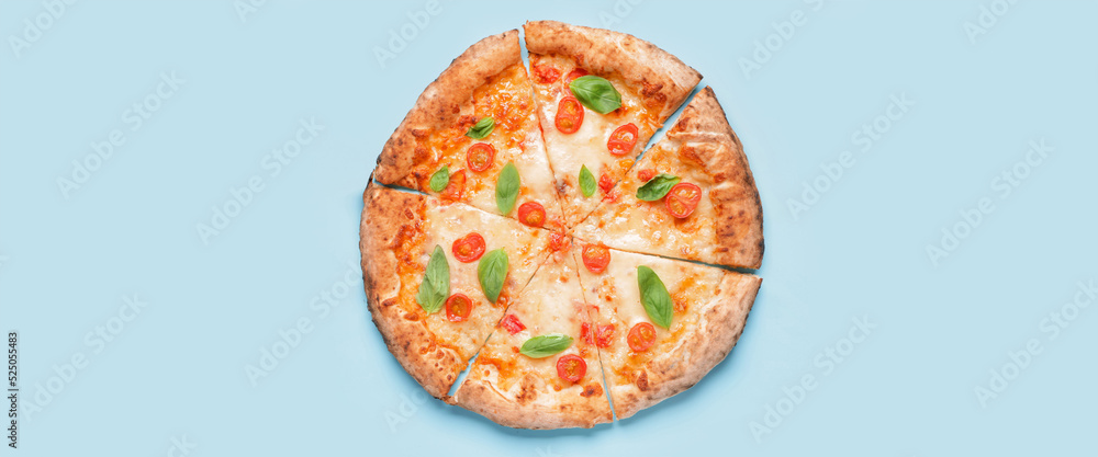 Delicious cut pizza Margarita on light blue background, top view Delicious cut pizza Margarita on light blue background, top view