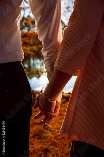 Couple holding hands in love