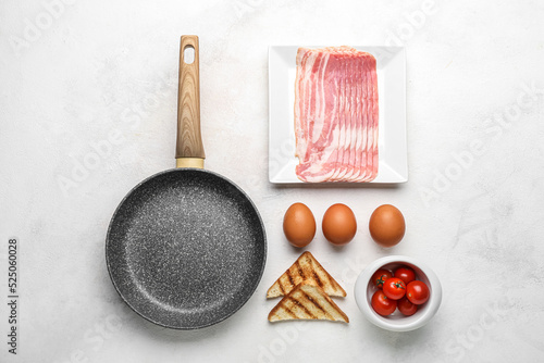 Composition with frying pan...