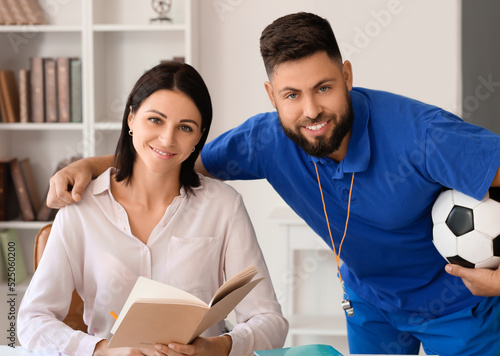 Teachers working in school ...