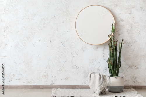 Basket with plaid, cactus a...