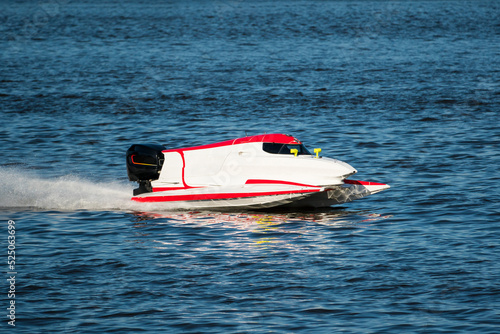 Powerful motorboat on blue water