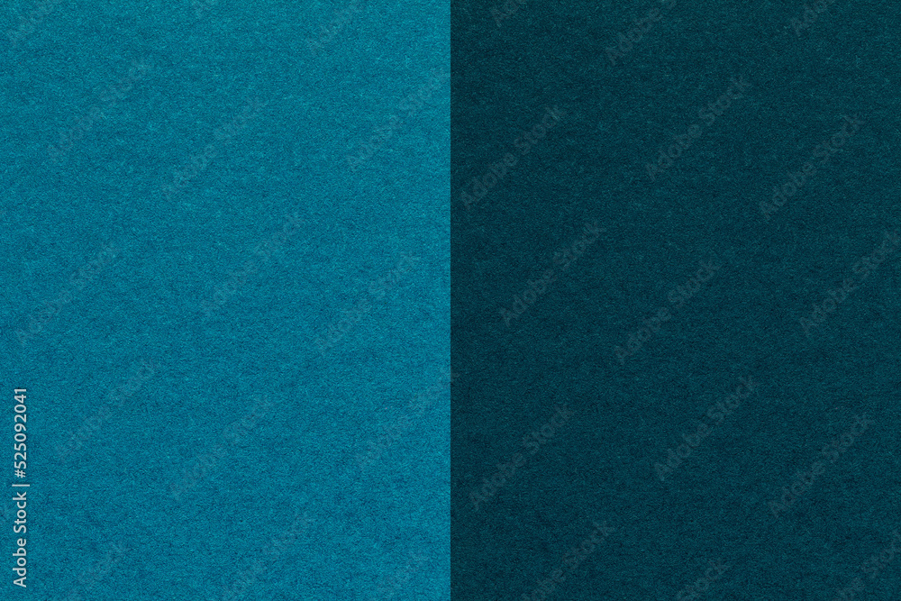 Fototapeta premium Texture of craft navy blue and turquoise paper background, half two colors, macro. Vintage dark cerulean cardboard.