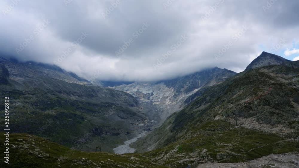 Timelaps of clouds in the mountains with incoming rain and thunderstorm Timelaps of clouds in the mountains with incoming rain and thunderstorm