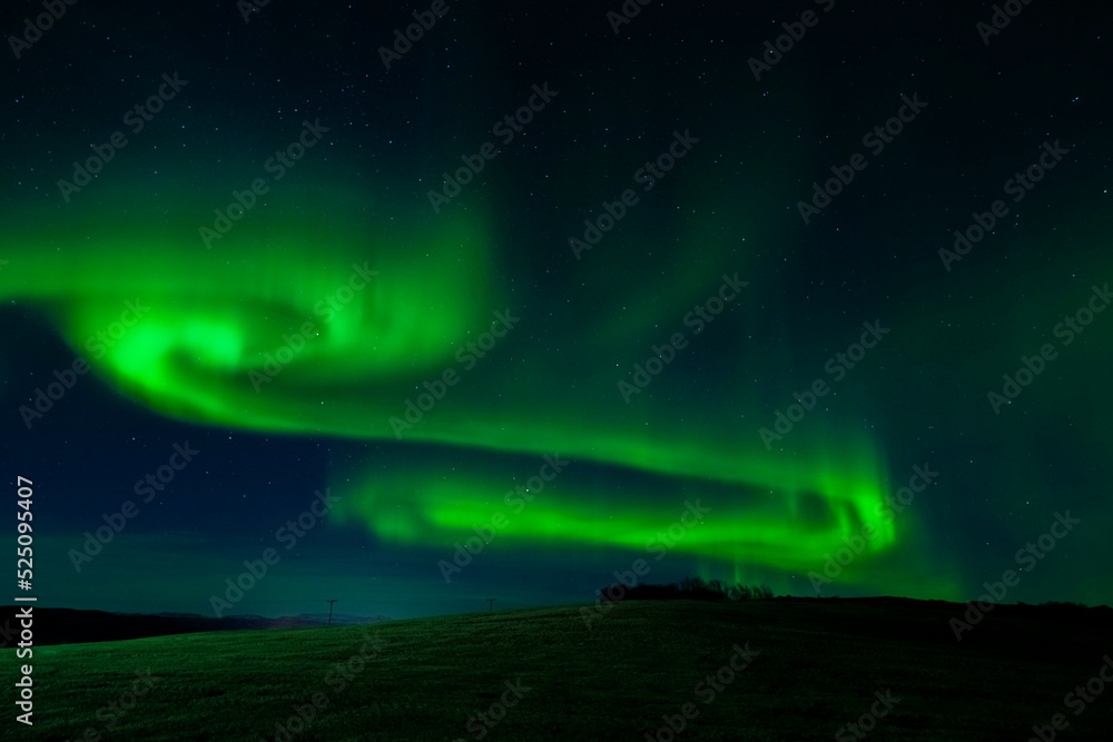Northern lights over the hill