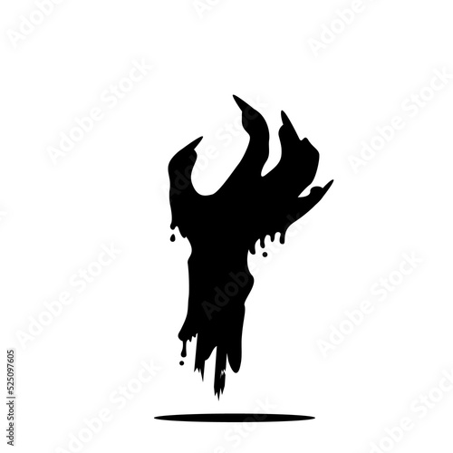 A zombie hand silhouette emerging from a grave to haunt the Halloween night. © anuwat