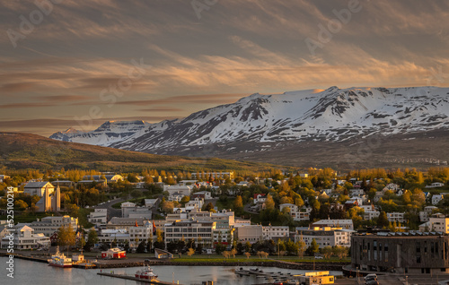 Beautiful view of Akureyri’s Old Town at Sunset from a high point in a summer day.